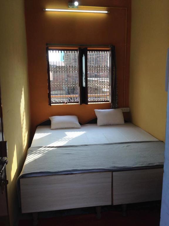 Paradise Inn Guest House Varanasi Habitación foto